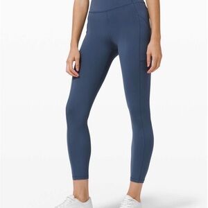 Lululemon Invigorate High-Rise Legging 25”. Color: Iron Blue. Size: 4